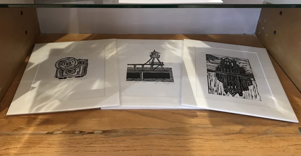 Three small linocut prints